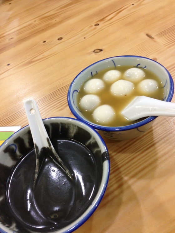 black sesame soup and mochi in ginger syrup