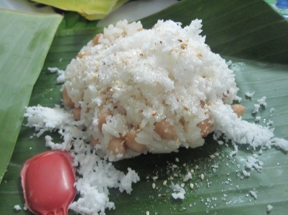 Vietnamese Xoi: sweet glutinous rice dessert with peanuts and fresh grated coconut